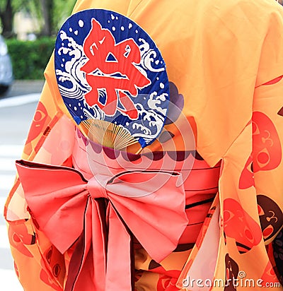 Japanese Yukata with a hand fan Stock Photo